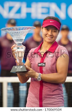 Shenzhen, China  4 January : Li Na of China with the winners trophy after finals of WTA Shenzhen Open 2014 at Shenzhen Longgang Sports Center on 4 January 2014 in Shenzhen, China