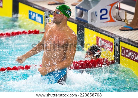 Hong Kong - 29 September 2014: Chad Le Clos of South Africa celebrates after winning of Men\'s 100M Freestyle final during the FINA Swimming World Cup 2014 at Hong Kong on 29 Sep 2014