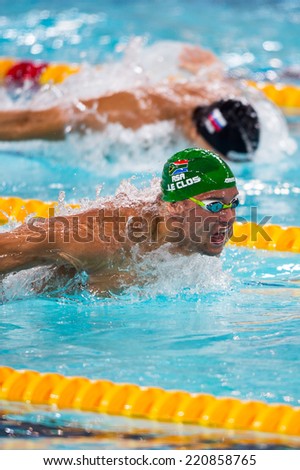 Hong Kong - 30 September 2014: Chad Le Clos of South Africa swims to win the Men\'s 100M Butterfly final during the FINA Swimming World Cup 2014 at Hong Kong on 30 Sep 2014