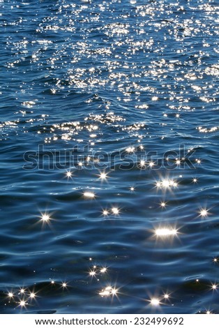 Lake Baikal. Sun spots are on the waves. Natural background
