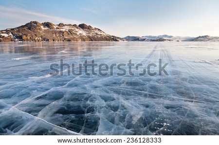 Lake Baikal. Winter morning. Ice road on Olkhon island