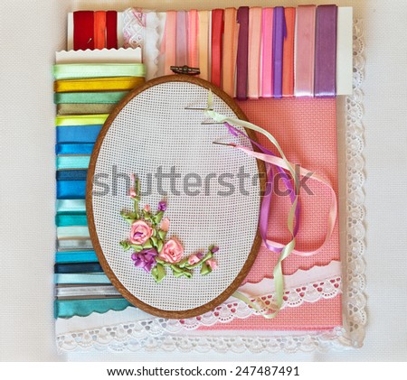 Needlework. Embroidery ribbons. Accessories: canvas, tambour and kit of satin ribbons