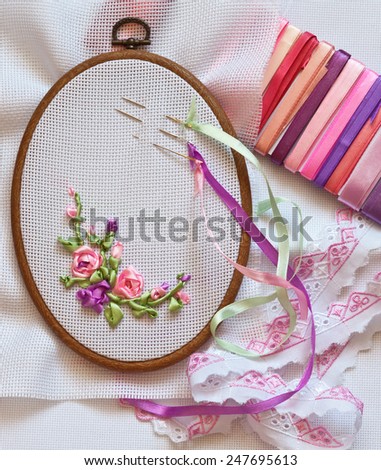 Embroidery ribbons. Accessories: canvas, tambour, needles and kit of satin ribbons