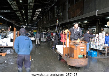 Workers at entrance to Tsukiji fish market, Tokyo, Japan