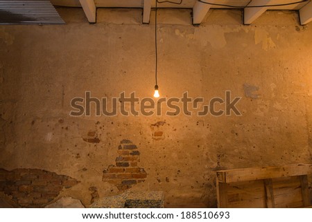 The light bulb in the dim-light room