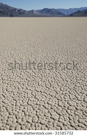 A vertical view of a dry lake bed at The Racetrack in Death Valley, CA