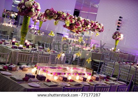 Beautiful table decorated with flower centerpieces for a reception