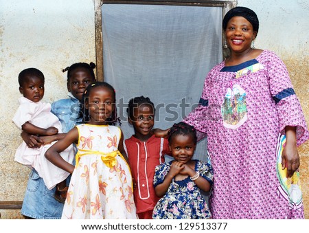 Family with pregnant African woman with five daughters