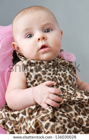stock-photo-cute-newborn-baby-girl-in-le