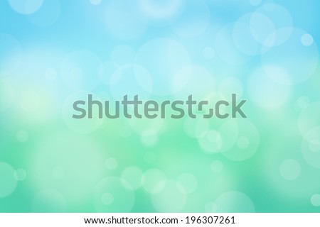 Airy background with bokeh and other lights effect on blue, green, yellow, turquoise background, nature concept