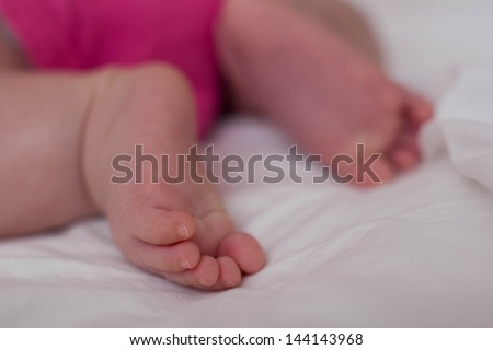 Beautiful Cute Baby Asian Girl\'s feet