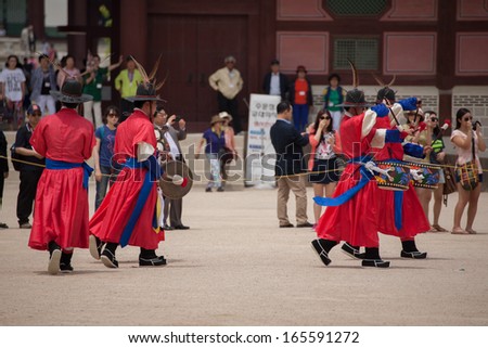 SEOUL, SOUTH KOREA - MAY 31: Kyungbokgung Palace Royal Guard-Changing Ceremony on May 31, 2013, in Seoul. This tradition is similar to the changing of the guard at Buckingham Palace in England.