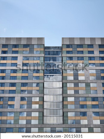 Clouds Reflected in Building Windows(Release Information: Editorial Use Only. Use of this image in advertising or for promotional purposes is prohibited.)