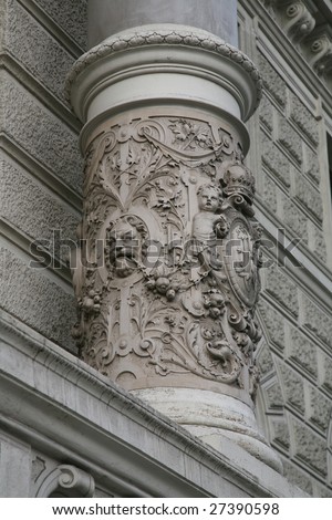 Intricately Carved Stone Pillar at Schonbrunn Castle in Vienna, Austria