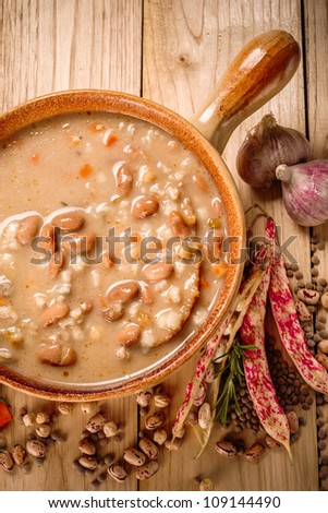 emmer and barley soup with vegetables, traditional italian dish