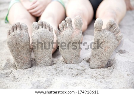 The sole of the feet in sand