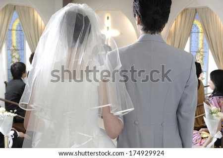 Back view of Japanese bride and groom