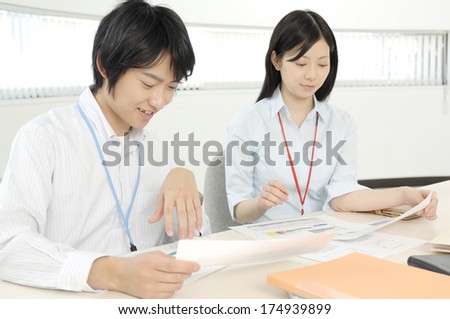 Japanese Man and Woman who carry out the meeting