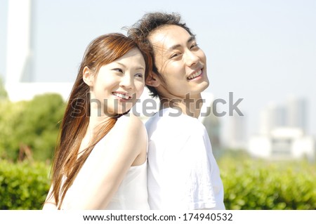 Japanese Couple to snuggle up back to back