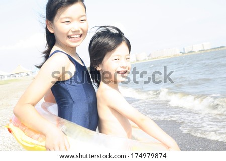 Japanese Boy and the girl who belonged under the ring of the float