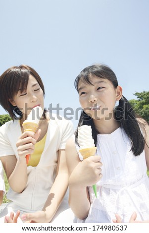 Japanese Mother and daughter eating ice cream
