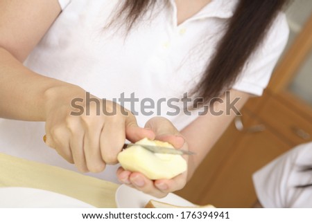 Japanese woman Hand Peeling apples