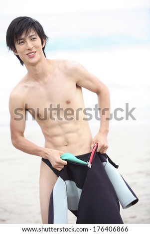 Japanese man with a wet suit
