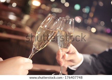 Japanese couple says cheers with champagne