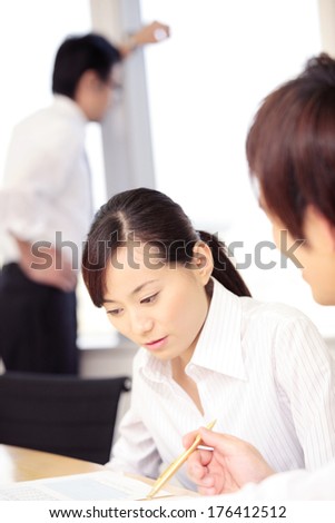 Career Japanese woman in a meeting