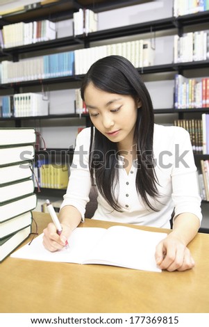Japanese students studying in the library