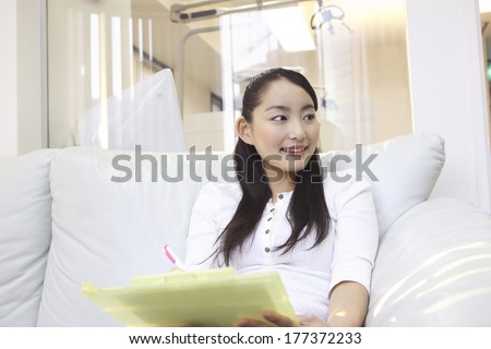 Japanese woman waiting for treatment in the waiting room
