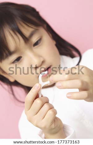 Children having the tooth treated
