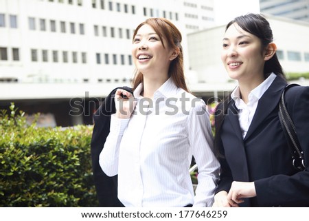 2 Japanese Office Ladies on the move