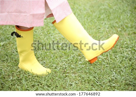Feet of Japanese woman wearing boots