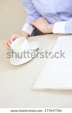 Japanese office lady with a cup of coffee