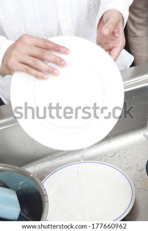 Hands of Japanese man who is washing