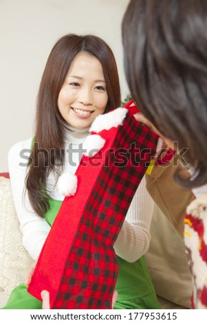 Japanese woman receiving gifts from man