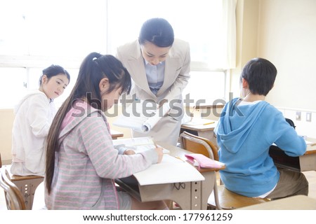 Female teacher who teaches students