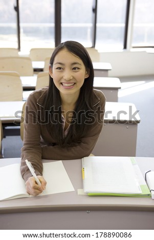 Japanese Female university student studying in the classroom