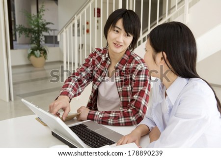 Japanese College students browsing on the computer
