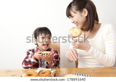 Girls eating cookies