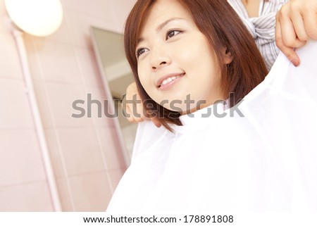 Japanese woman and hairdresser in a hair salon