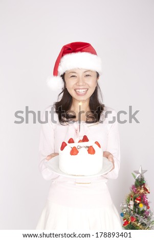 Japanese woman with cake