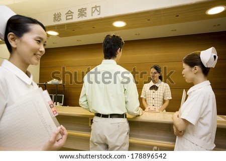 Japanese patients make an appointment in a hospital
