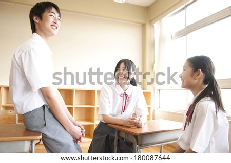 three Japanese middle students talking