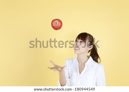 Japanese woman who throw an apple up