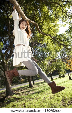 Japanese woman stuck on a tree