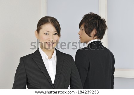 Young Japanese business woman and business man