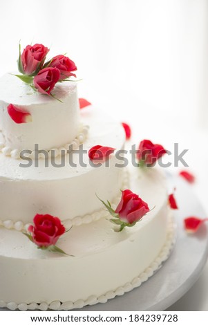 White cake with roses