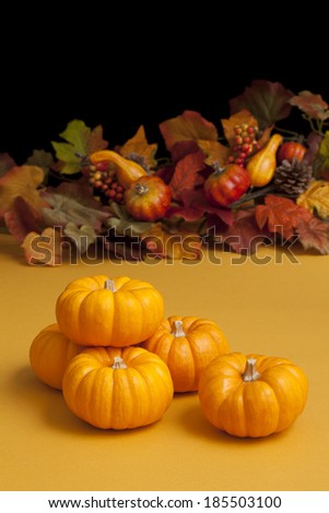 Pumpkin Halloween decorations on black and orange background
